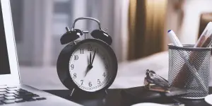 clock on a working desk