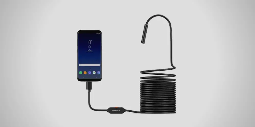 an endoscope camera connected to a smartphone