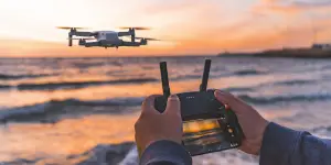 a man flying a drone