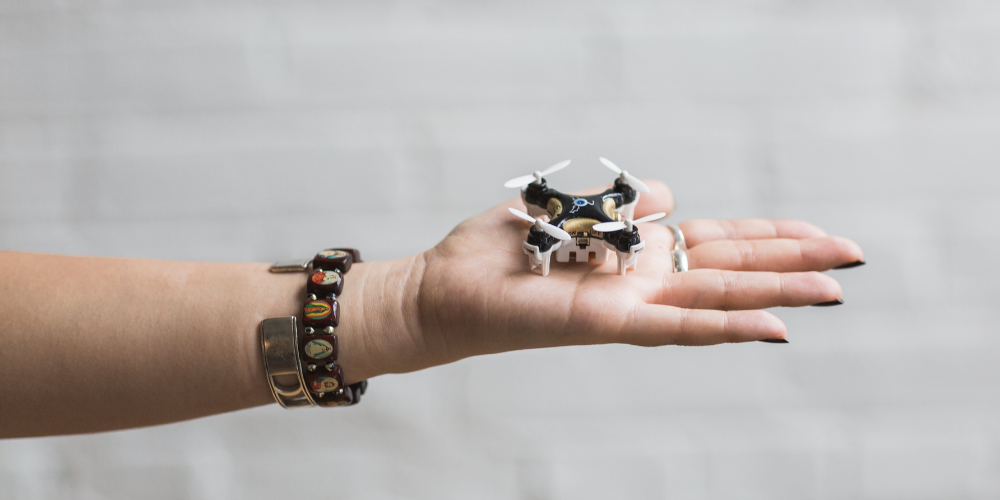 small drone a woman's palm
